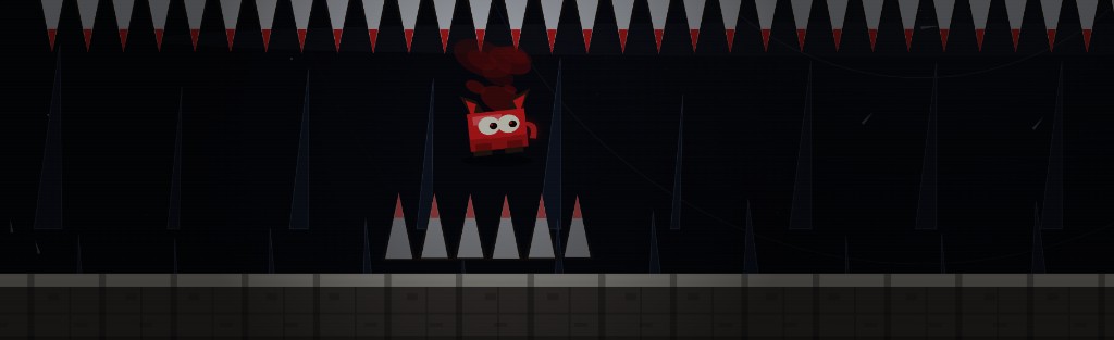 The red character hanging between a row of ceiling spikes and a row of floor spikes.